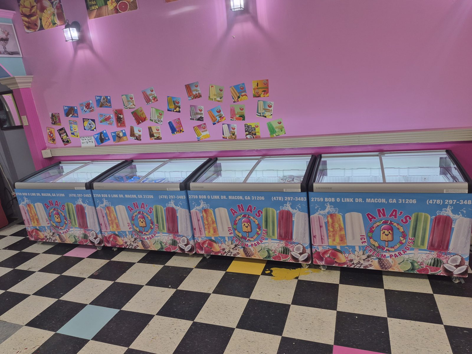 Inside Ana's Ice Cream Paradise — branded paleta freezers full of colorful Mexican popsicles
