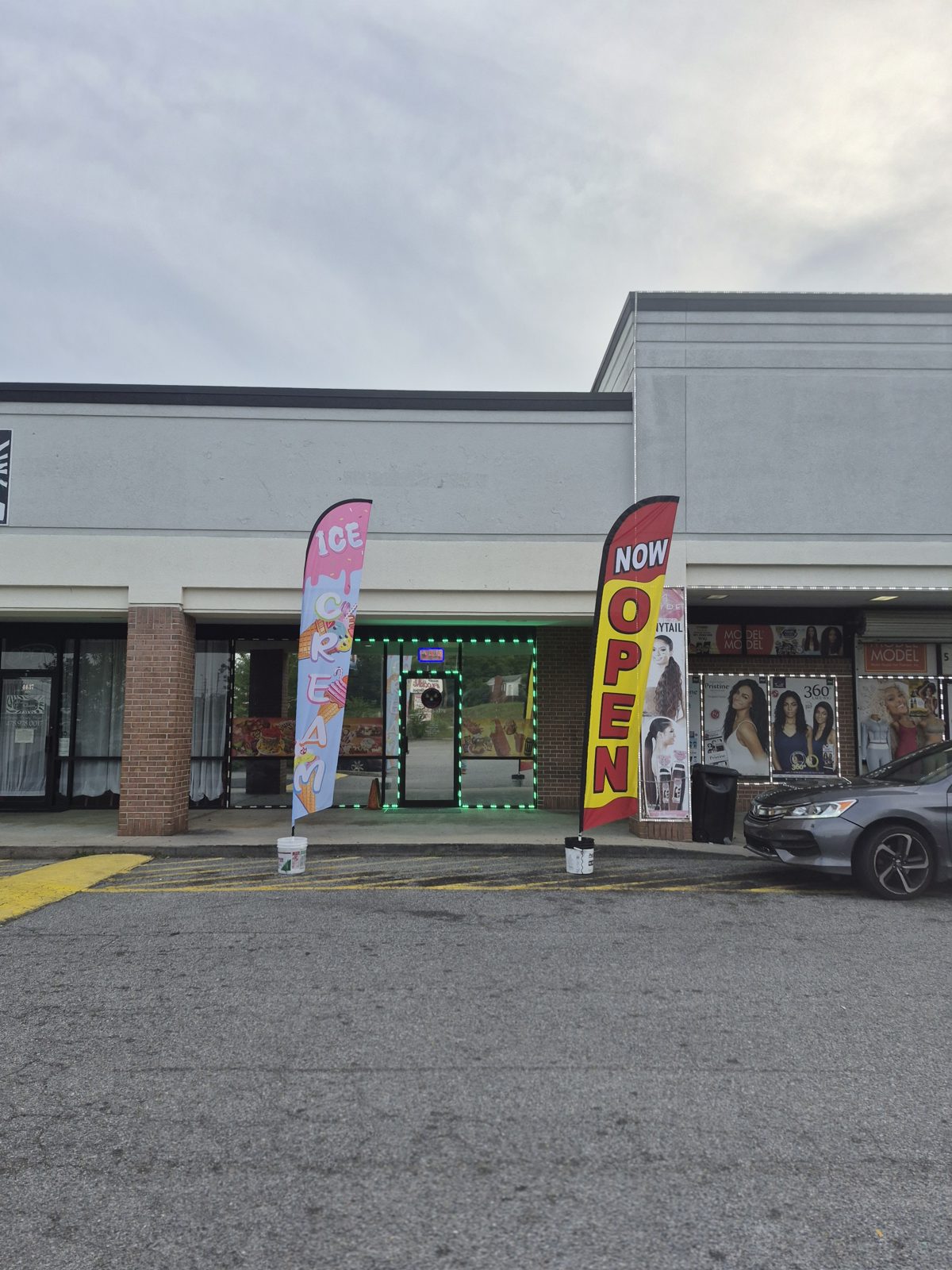 Ana's Ice Cream Paradise storefront in Macon, GA with a NOW OPEN sign